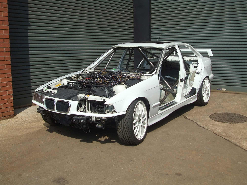 BMW E36 4dr Step 2 International Multipoint T45 roll cage kit. FIA Certificated